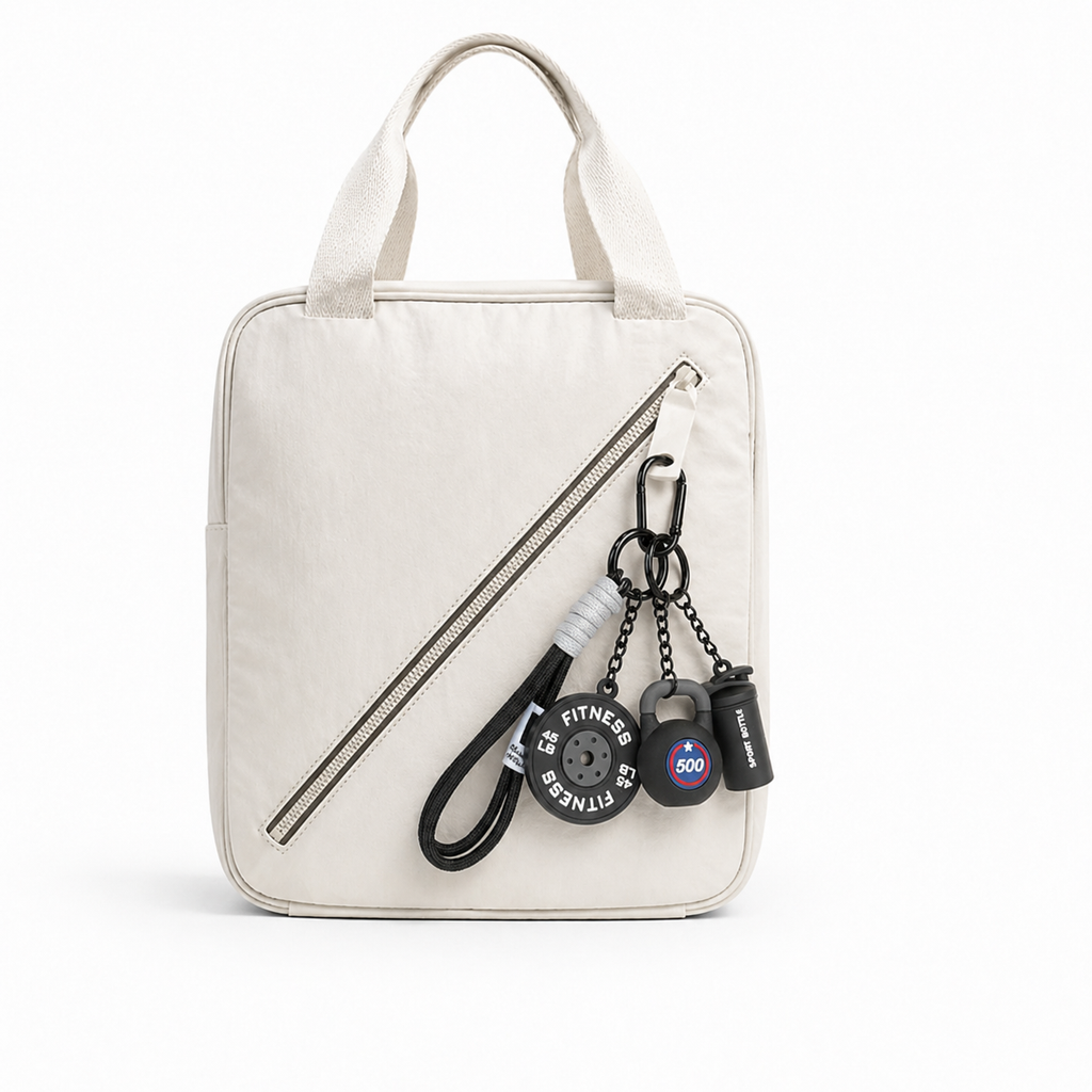 Black fitness bag charm set featuring a mini barbell plate, kettlebell, and shaker bottle. A unique gym gift for workout lovers.