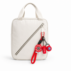 Red fitness bag charm set with a mini barbell plate, kettlebell, and shaker bottle. A unique gym gift for workout lovers.